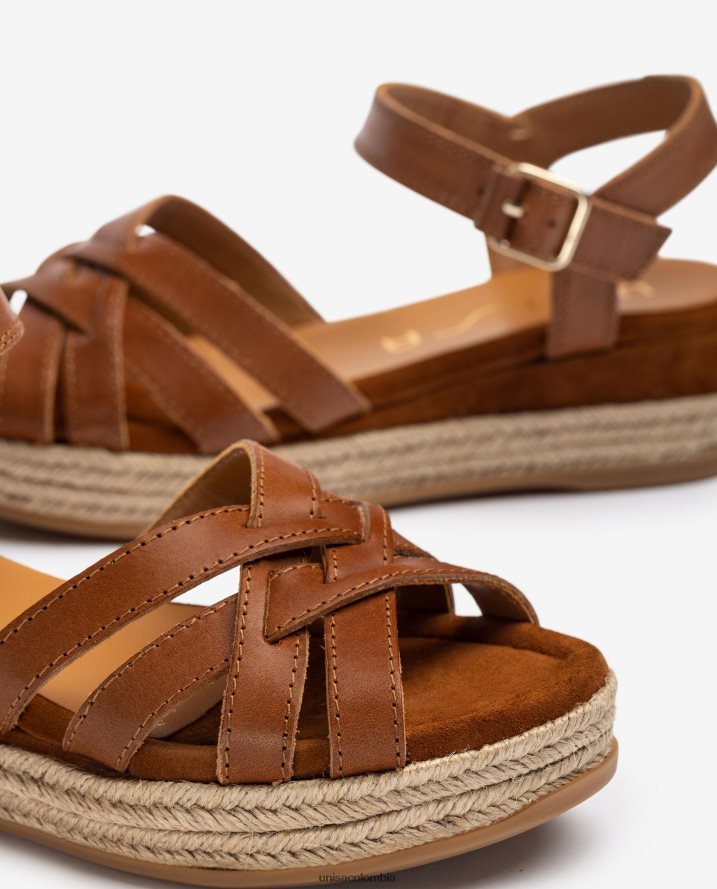 co Unisa mujer sandalias de piel con hebilla metalizada marrón F0X80H429